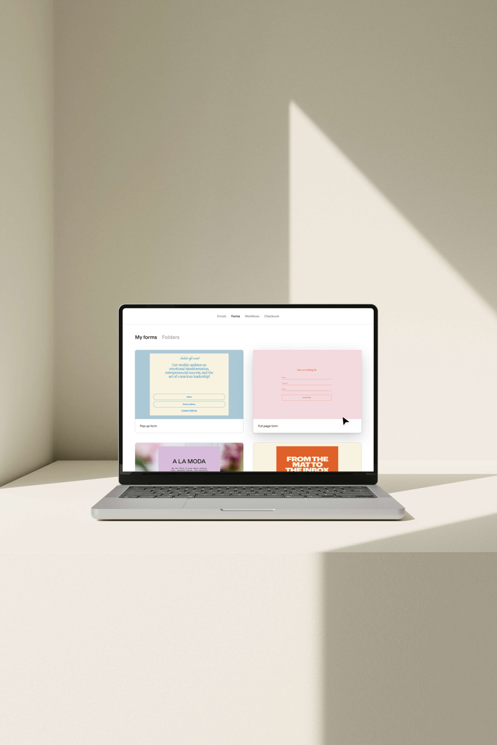 Flodesk Email marketing dashboard mockup on a laptop